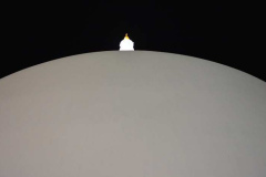 The spire is lost against the sweeping mass of the dome.