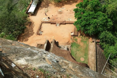 The view down onto the lions paw entrance. The small figure (toward photo top) gives some sense of the scale. The rusty steel railings were indeed strong enough.