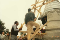 Relics and sacred objects being added to the stupa.