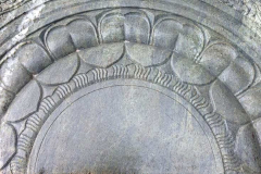The lotus at the center of the moonstone. The detail of workmanship is impressive.