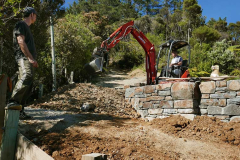 The stupa forecourt is leveled and the road landscaped all ready for surfacing.