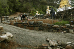 The north wall of the stupa forecourt is about half way done.