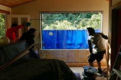 The glass going into the Chao Khun kuti window.