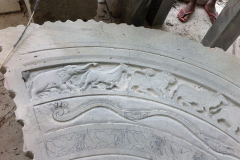 The stupa entry moonstone taking shape. Solid granite!