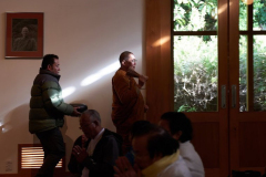 Ajahn Pum sprinkles a Vesak blessing.