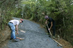 Geoff and Quentin working of cross-drainage to ensure water erosion on the new road is minimal.