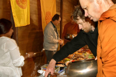 Lindsay serving Venerable Thanavaro.
