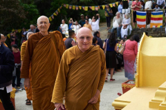 Monks arriving at the stupa.