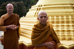 Monks arriving at the stupa.