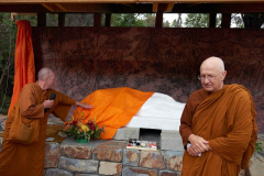 The buddha rupa is unveiled.