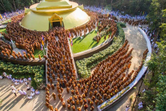 Monks and laity gather around the stupa. See all images here Monks and laity gather around the stupa. See all images here