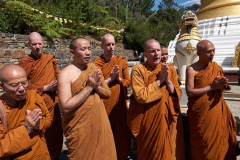 The Sangha chant paritta while the box of blessings is filled.