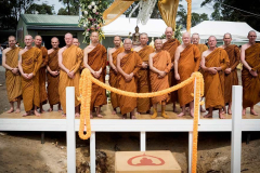 The sangha overlook the foundation stone repository.