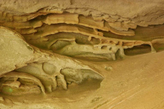 Wind blown sandstone cave formations in the gorge.