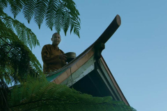Ajahn Kusalo repairing his kuti stove-chimney in preparation for colder days to come.