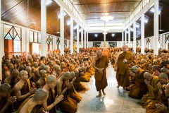 Luang Por Liam leaving the main dhamma hall.