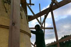 Felix working on cleaning the upper section of the stupa.