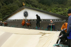 The south-end crew buckling up the marquee ready for Kathina.