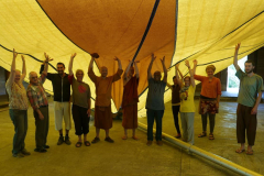 Kathina: the end... residents taking the tent down.