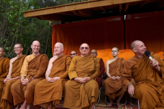 Stupa dedication: monks assembled in front of the west side reclining buddha rupa.