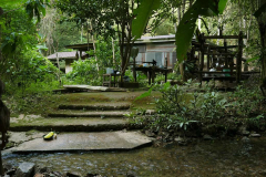 The bowl washing area (foreground) with the kitchen (mid-ground) and sala - you can see the sala bell on the left corner.