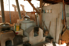 The fire left is for robe dye-washing. The fire and building at right is a steam sauna. Evening temperatures could be quite cold so this is a nice bathing option.