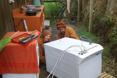 The washing machine is dead. Monks are trying to make a change :) - but can we get the faulty part?