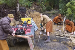 With timber at a premium we are recycling *everything*. The sangha pulls nails to keep Bruce supplied as best we can.