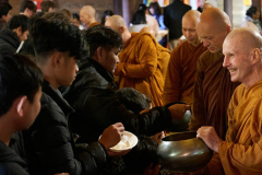 The sangha goes on rice pindapat.