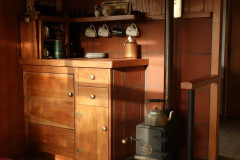 The wood box and stove in Ajahn Kusalos kuti.