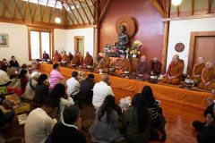 The Sangha is assembled and Kathina proceedings begin.