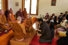 The Kathina cloth is offered to the sangha.