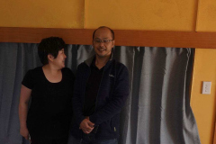 Arunee and Kheng take a well earned rest after installing the curtains in Ajahns kuti.