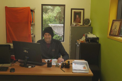 Lindsay making sure the monastery wheels turn smoothly in the office.