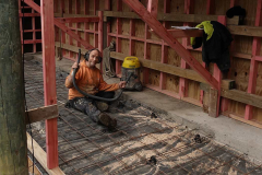 Bruce cleaning out the basement slab ready for concrete.