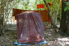 Venerable Sumangala has his umbrella tent set up.