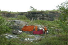 We find another rock promontory and lay out robes to dry.