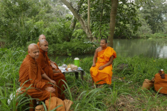 A monk we had met a couple of days earlier passed us in a car and offered to set up 'tea by the river.' Delightful.