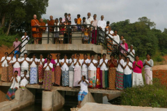 After the meal offering our kind donors posed for a photo on the canal sluice gate.