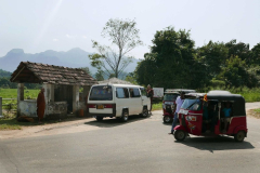 From the van we transfer into tuk-tuks. Those hills are getting closer.