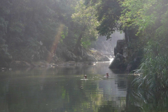 The river below the kuti provides an idyllic bathing spot.