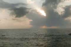 A hour after sunrise and two local fishermen come out to set their net.
