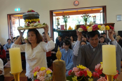 At the Vietnamese temple for Kathina. The cloth and requisites being offered to the sangha.