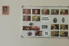 The (regularly changing) community board in the dana sala. Luang Por Sumedho (left (as in orientation not departure :)) is very much a part.