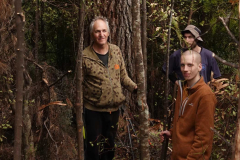 Forest persons clearing a track between the new kuti and kuti