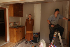 The limited-mobility kuti in the vihara takes shape. Bruce is working on the frame for a lovely lead light window.