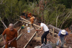 The kuti foundation posts are in. Materials for the sub-floor are on site. It all just needs to be stuck together.