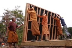 The new monks kuti sees the first wall raised. Three more to go - then and roof.