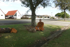 Tudong: After pindapat resting at the root of a tree.