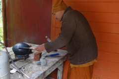 Firing an alms bowl - both to remove the decaying lacquer and give a uniform finish.